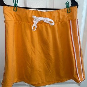 orange mini skirt